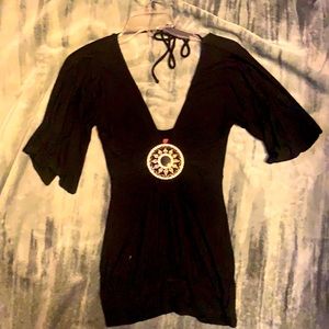 Black sky top has only been dry cleaned.